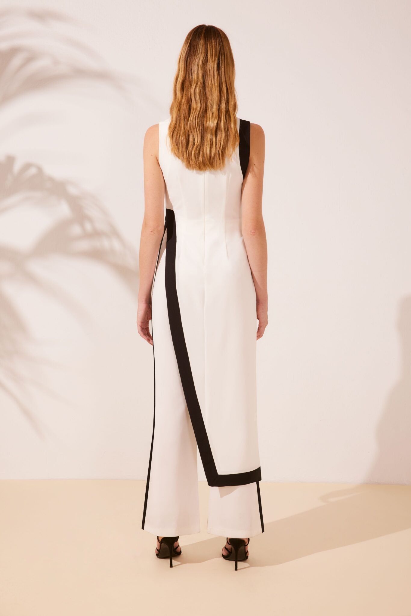 Arggido Jumpsuit in ivory and black.