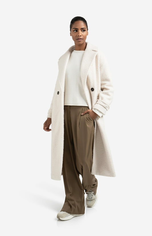 Long bouclé coat with belt and oversized fit