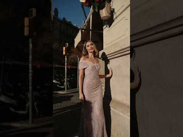 Veni Infantino A breathtaking, strapless evening gown that flows to the floor,