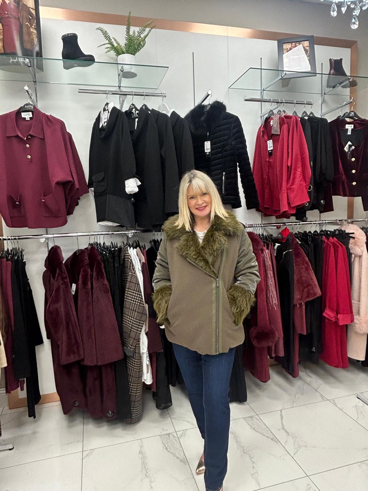 Carla Ruiz green fur coat