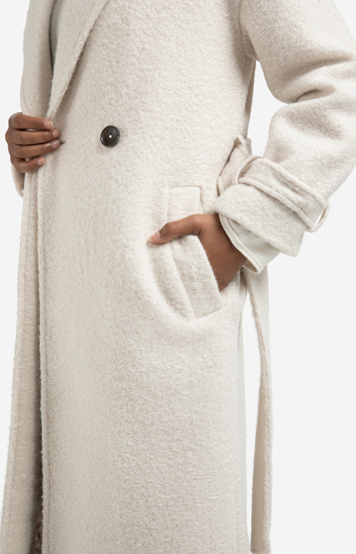 Long bouclé coat with belt and oversized fit