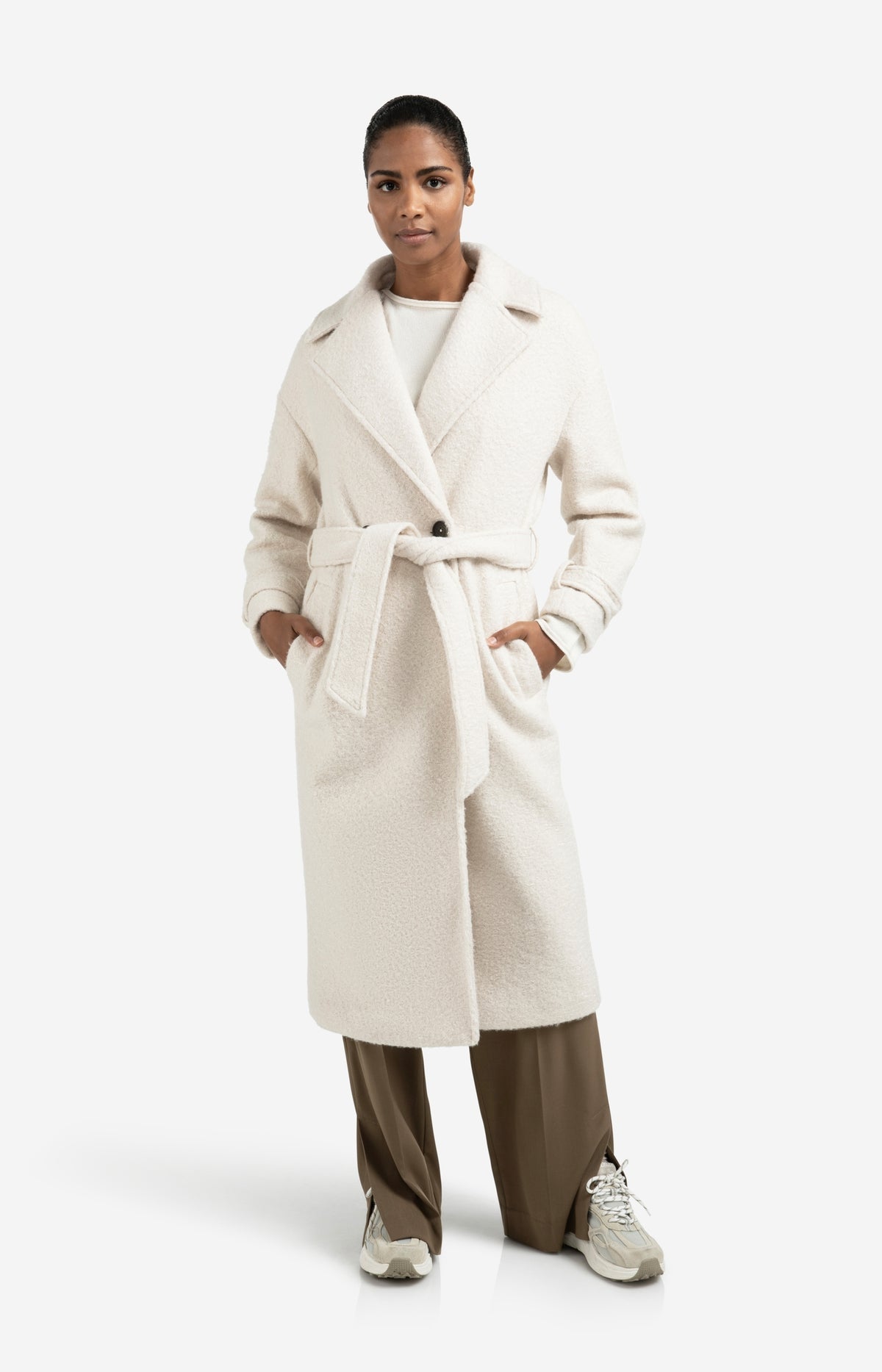 Long bouclé coat with belt and oversized fit