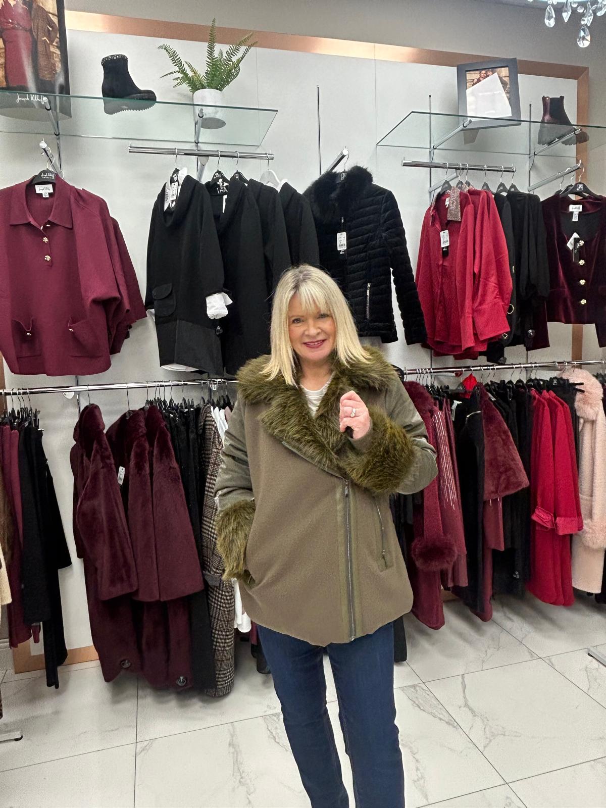 Carla Ruiz green fur coat