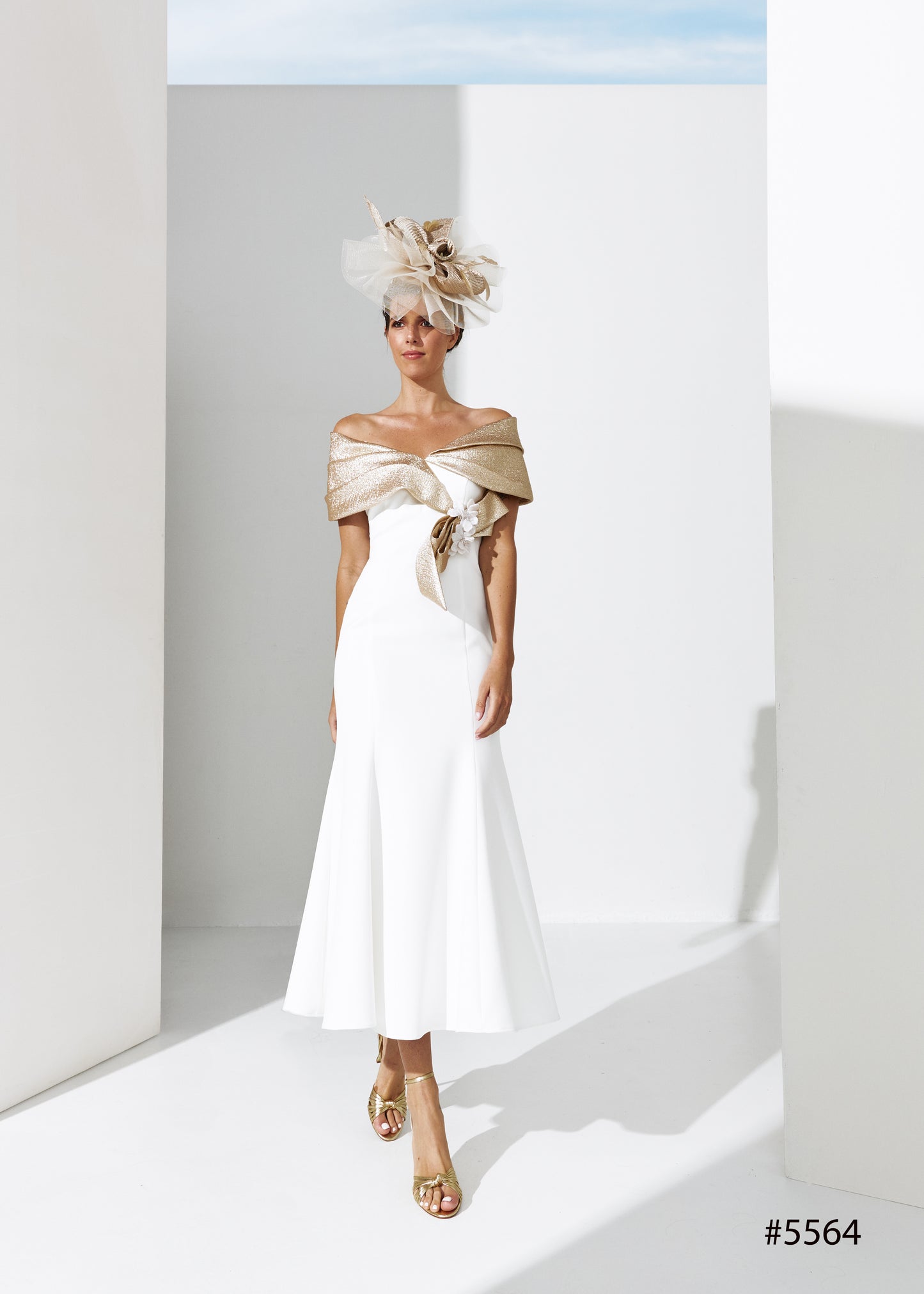 Ivory/gold mother of the bride and groom.