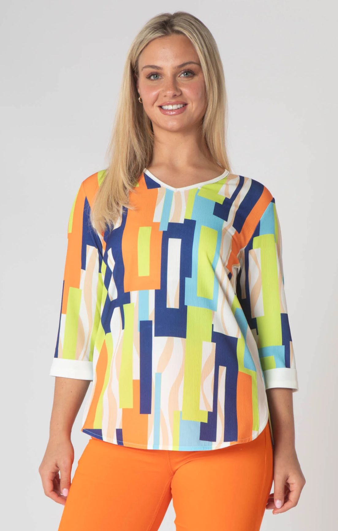 Paige v neck top with white trim- orange and green.