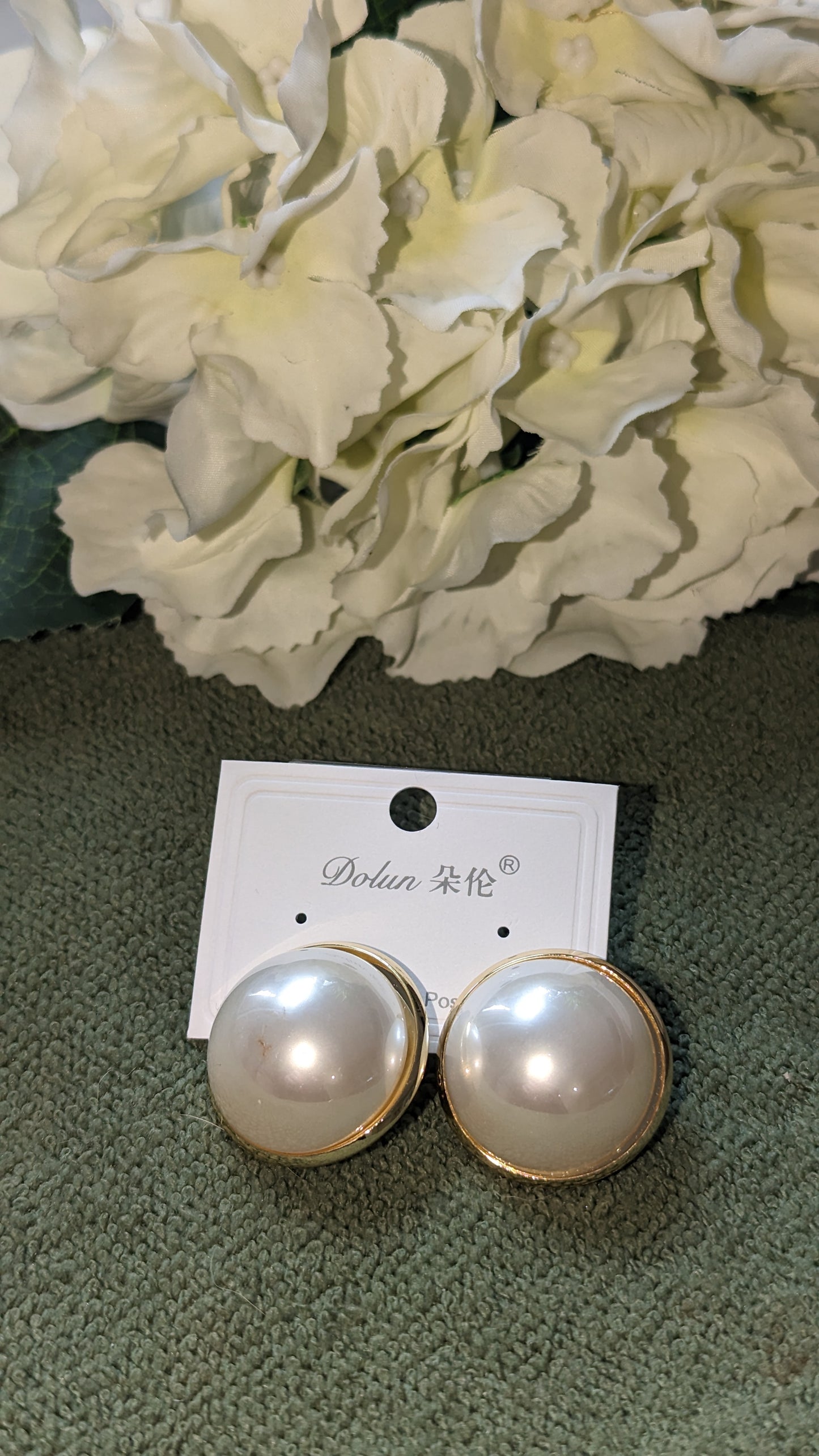 Large round pearl earrings