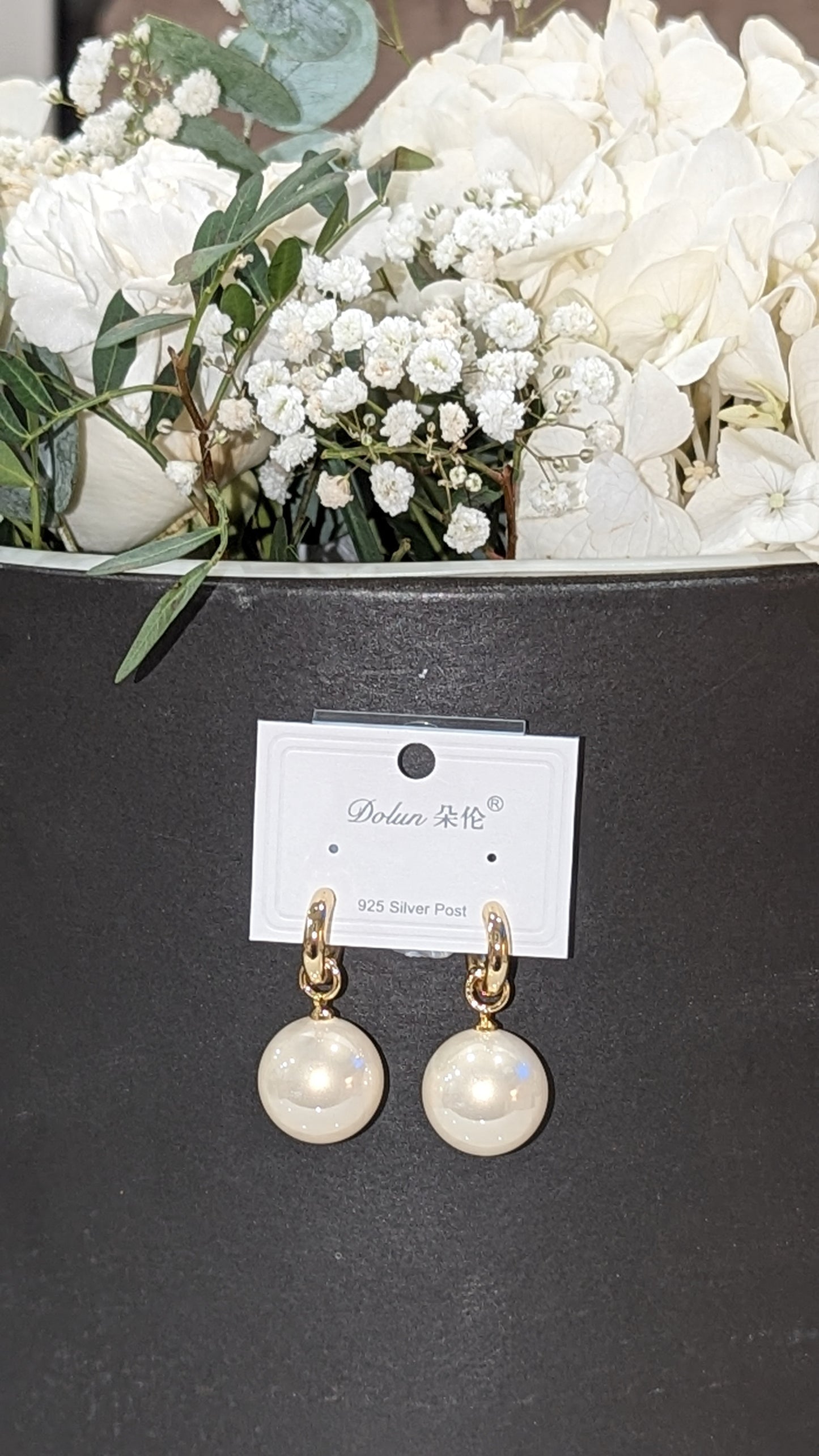 Large pearl earrings