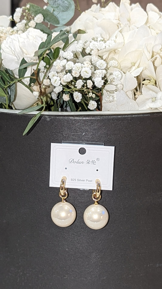 Large pearl earrings