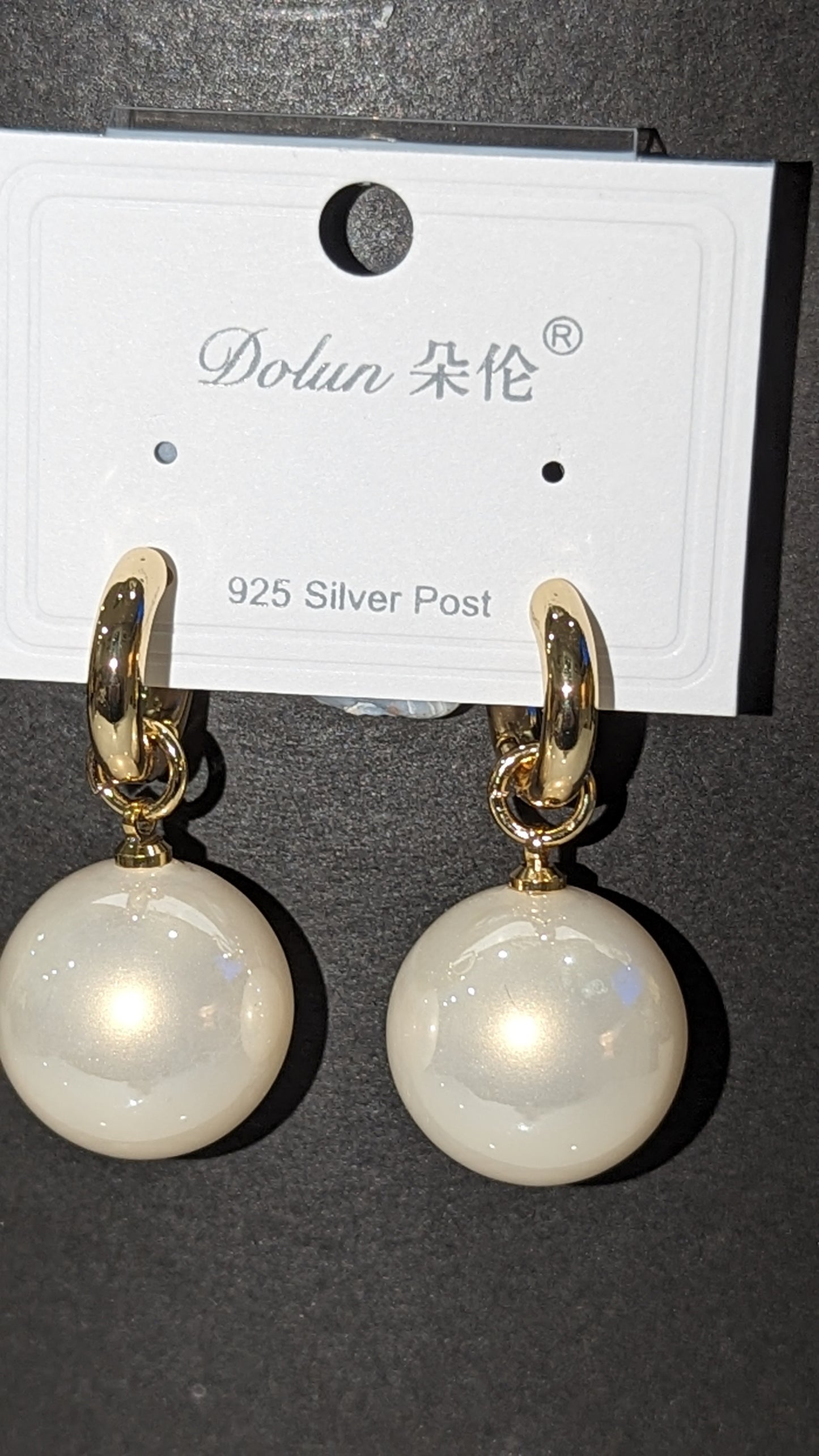 Large pearl earrings