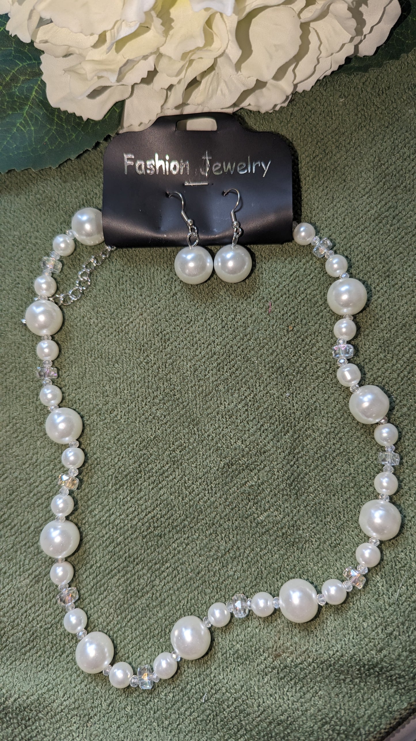 White pearl necklace and earrings