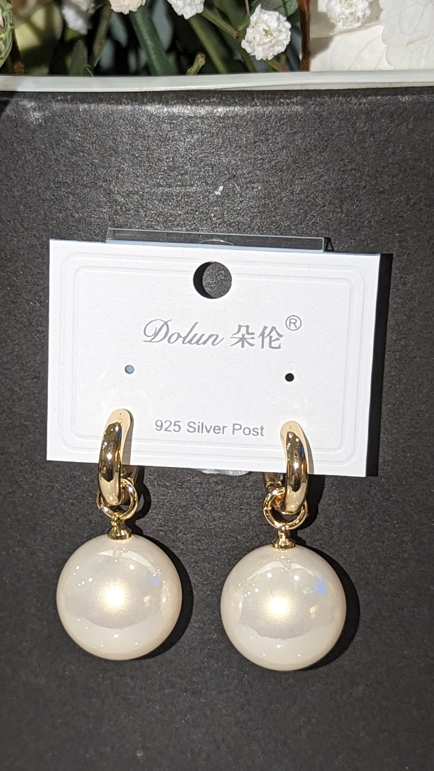 Large pearl earrings