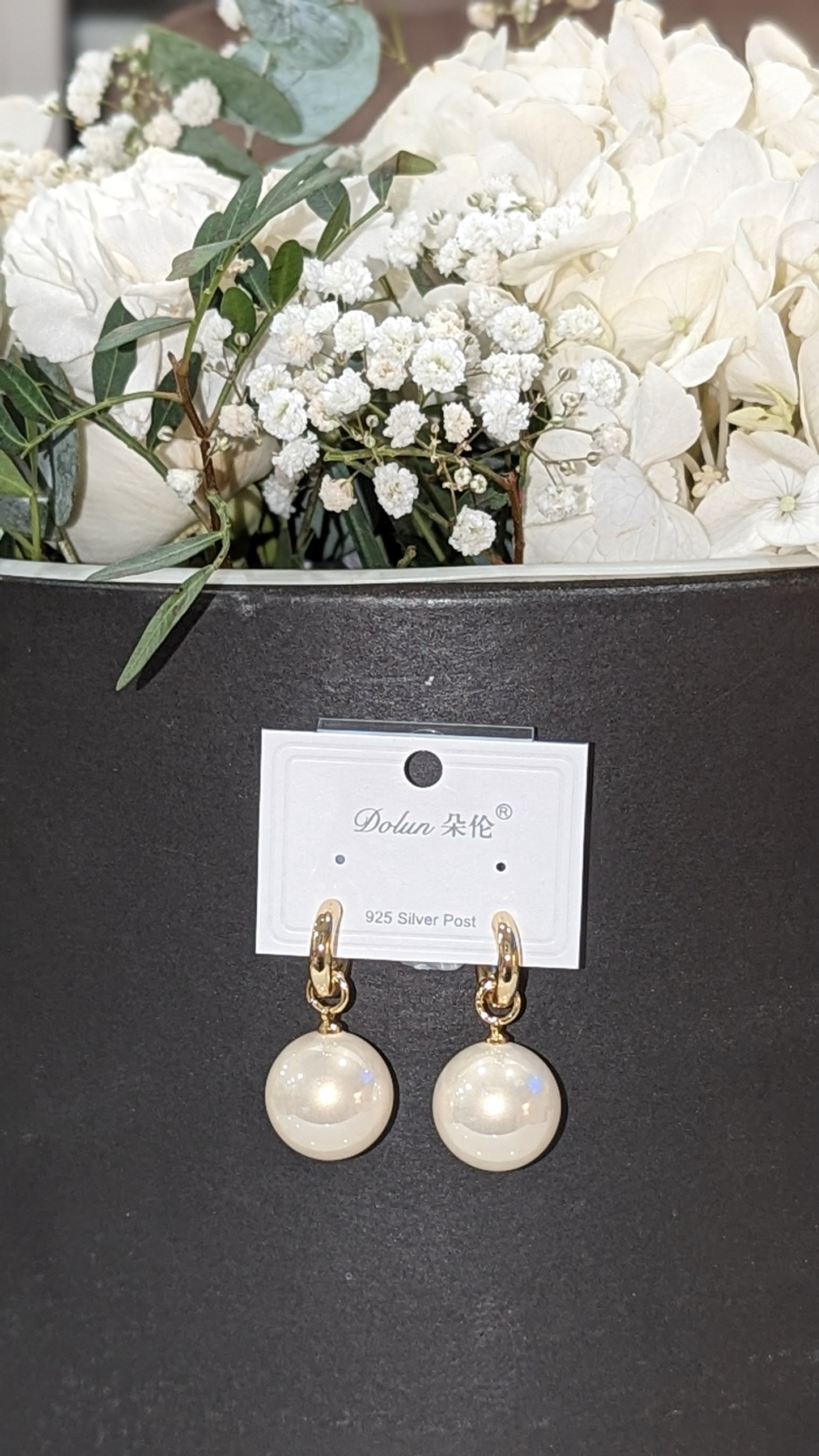 Large pearl earrings