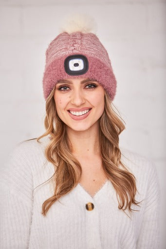 Pink hat with rechargeable light